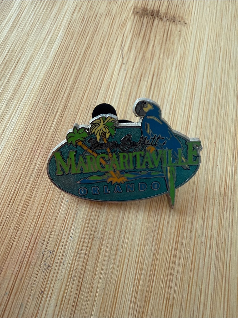 Margaritaville Parrot Logo Pin in Blue and Green